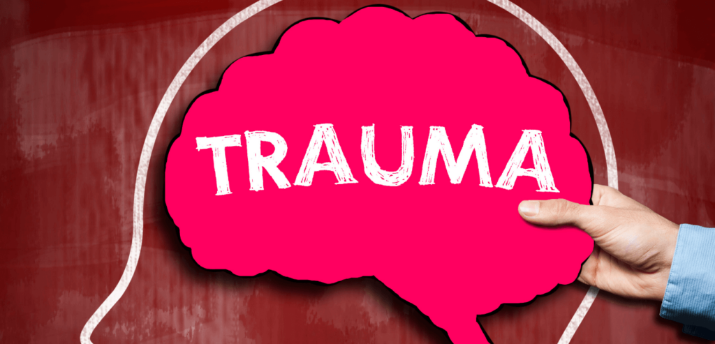 TRAUMA brain red sign board with a hand