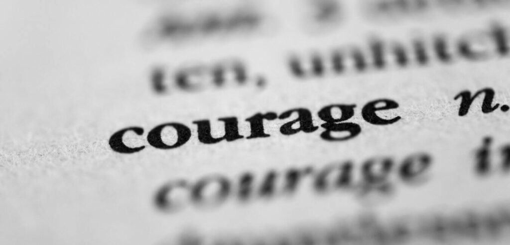 courage typed on paper